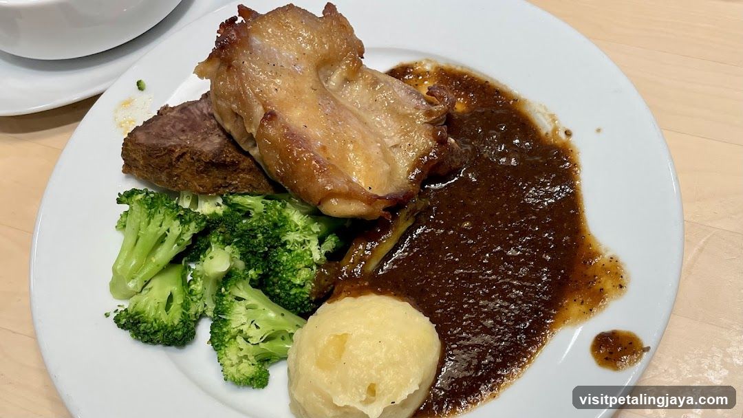 Plate of Roasted Meat with Broccoli and Mashed Potatoes