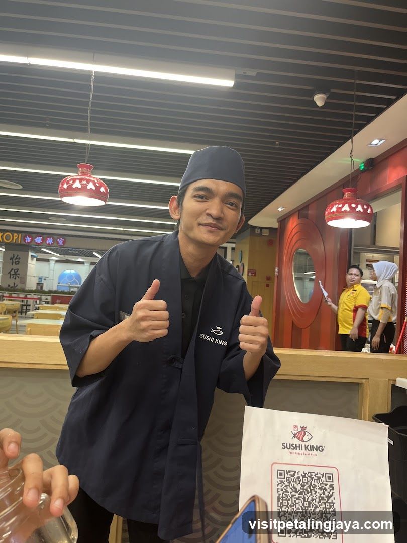 Sushi King Staff Giving Thumbs Up