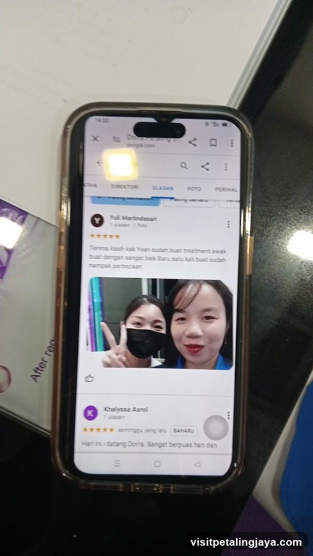 Phone Screen Showing Google Maps Review