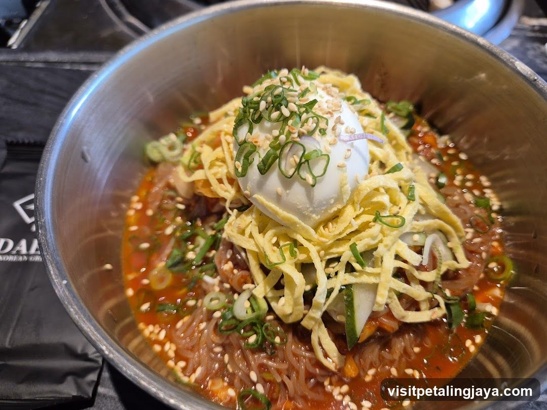 Spicy Noodle Bowl with Egg and Crispy Tofu Skin