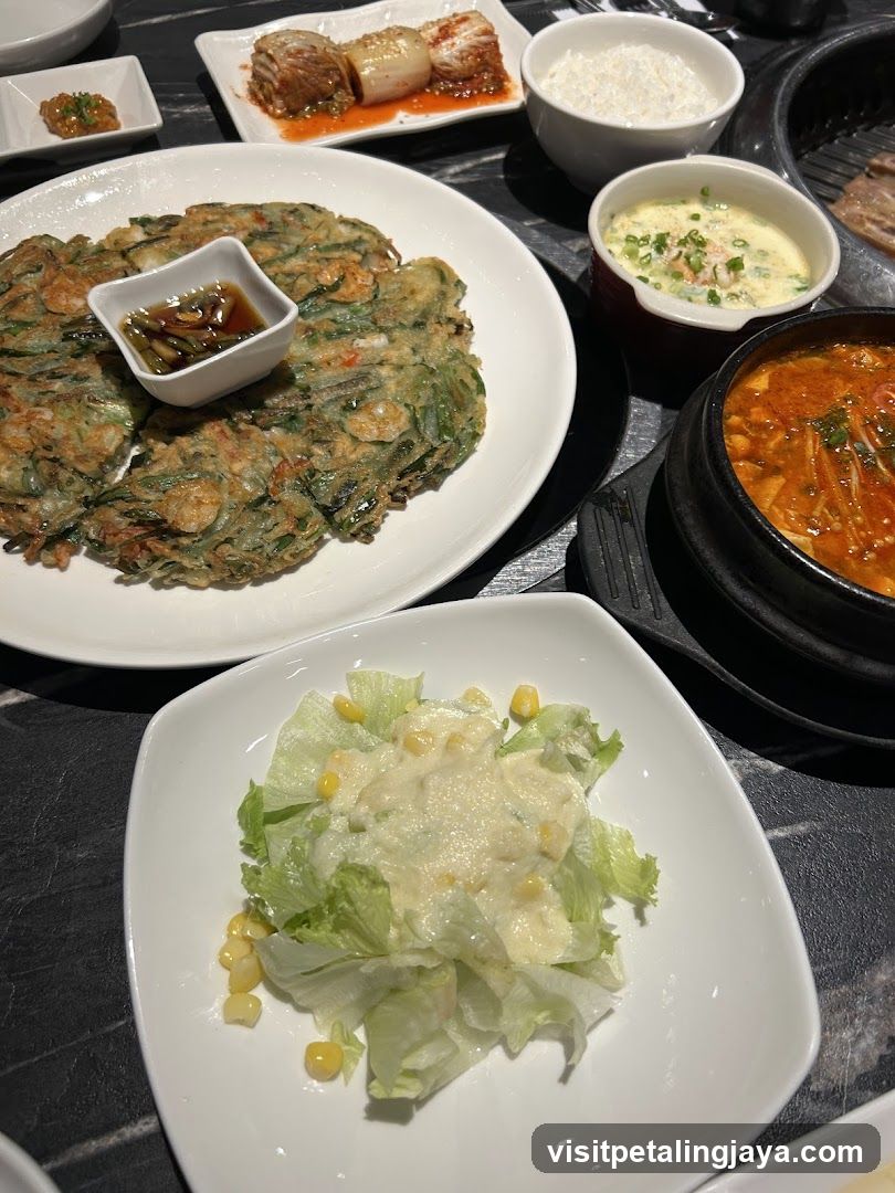 Korean Table Setting with Various Dishes