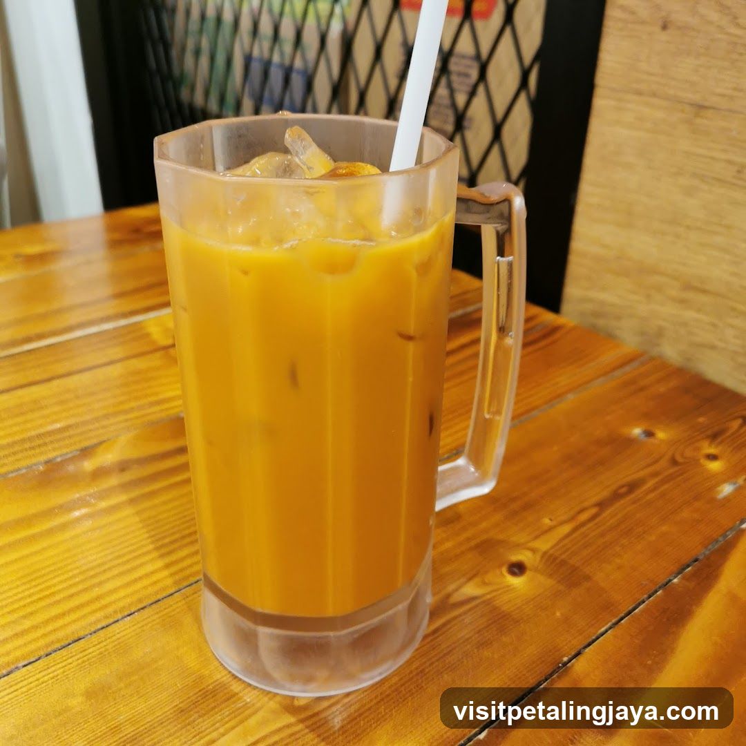 Iced Orange Drink in Glass Mug