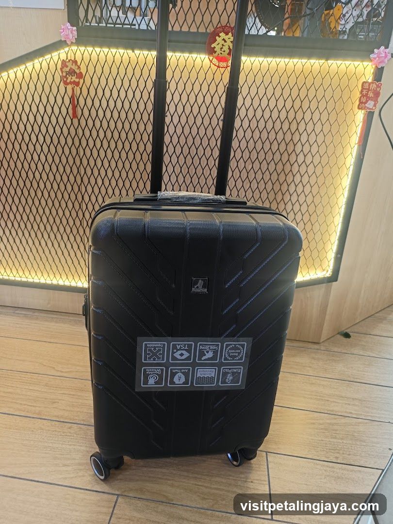 Black Suitcase with Features Sticker