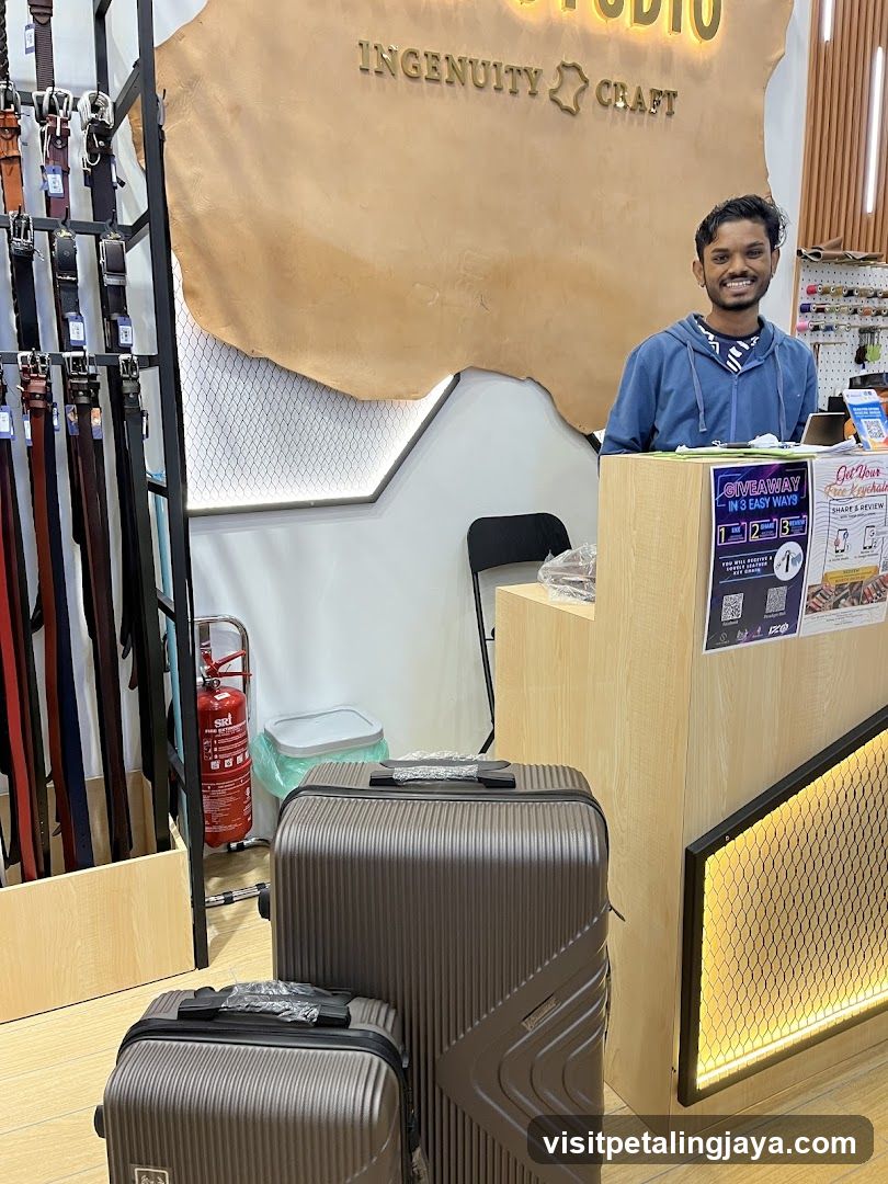 Interior of a shop with luggage and staff