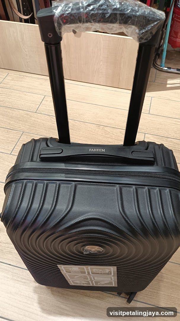 Black Suitcase on Floor