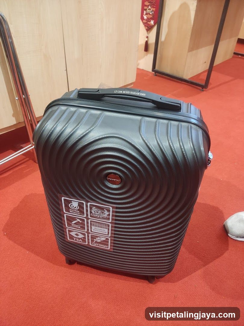 Black Suitcase with Spiral Design