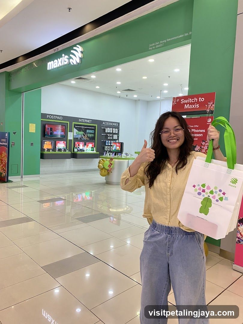 Woman giving thumbs up in mall