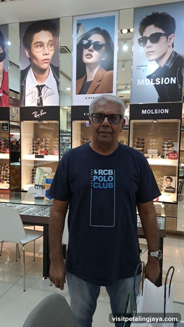 Man in RCB Polo Club T-shirt inside a store