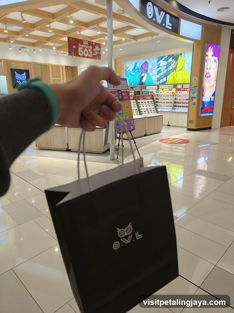 Shopping bag in mall corridor