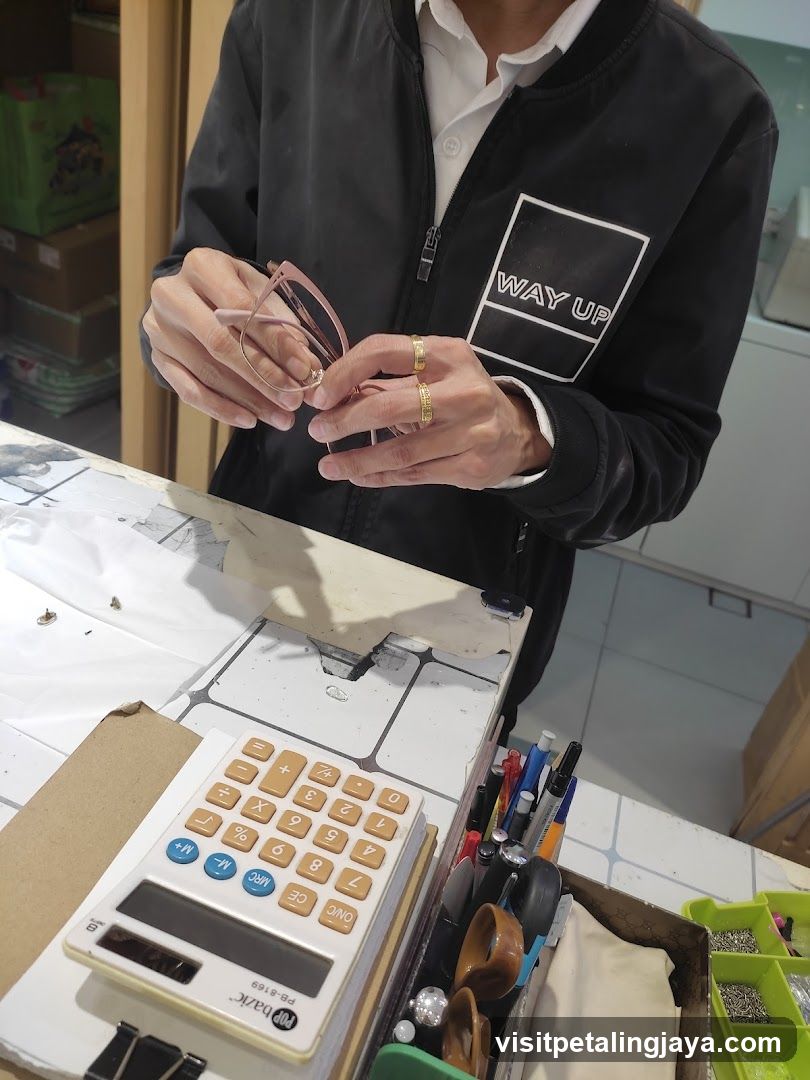 Staff working with eyewear tools