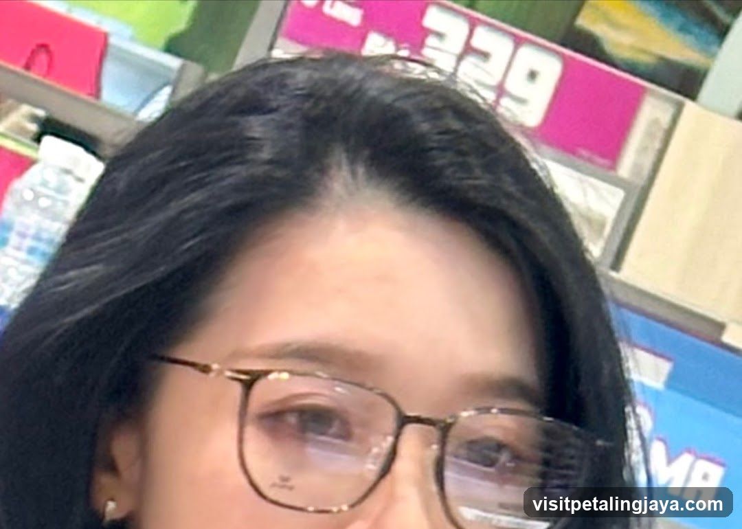 Person with glasses in a store setting