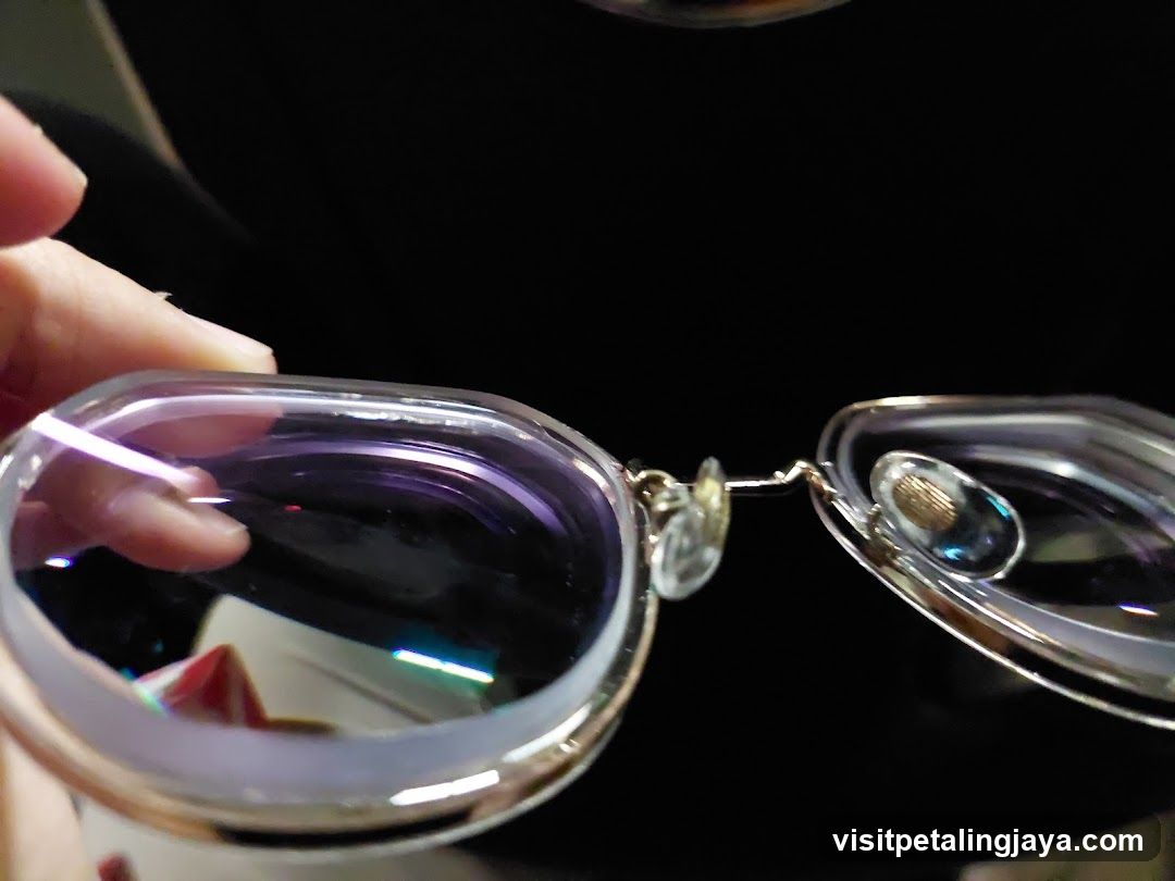 Close-up of eyeglasses with reflective lenses