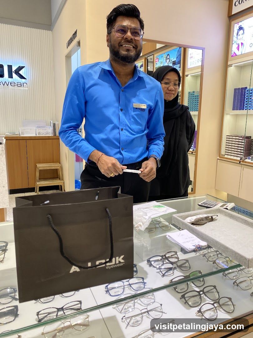 Eyewear Store Interior with Staff and Customer