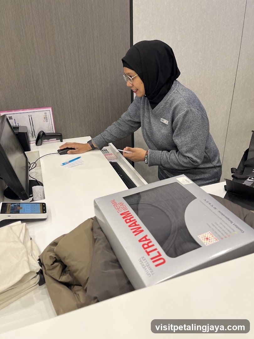 Staff at checkout counter with products