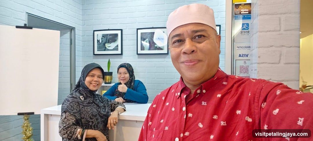 Group selfie in office or reception area
