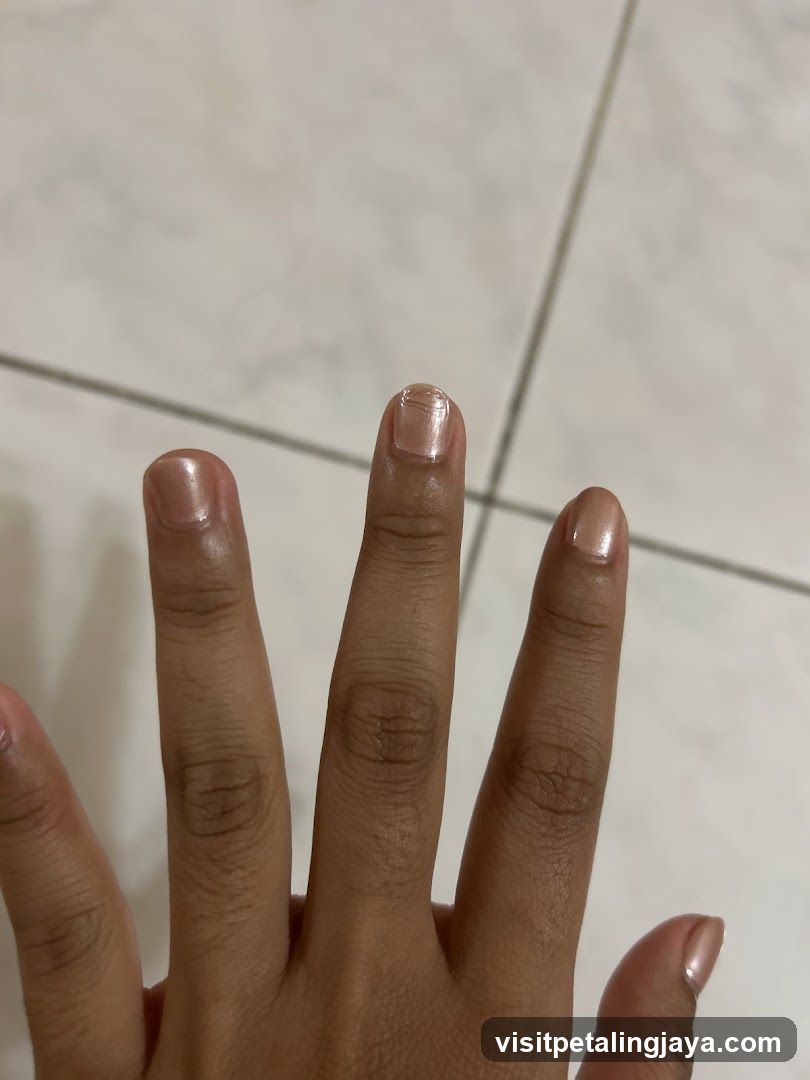 Hand with manicured nails