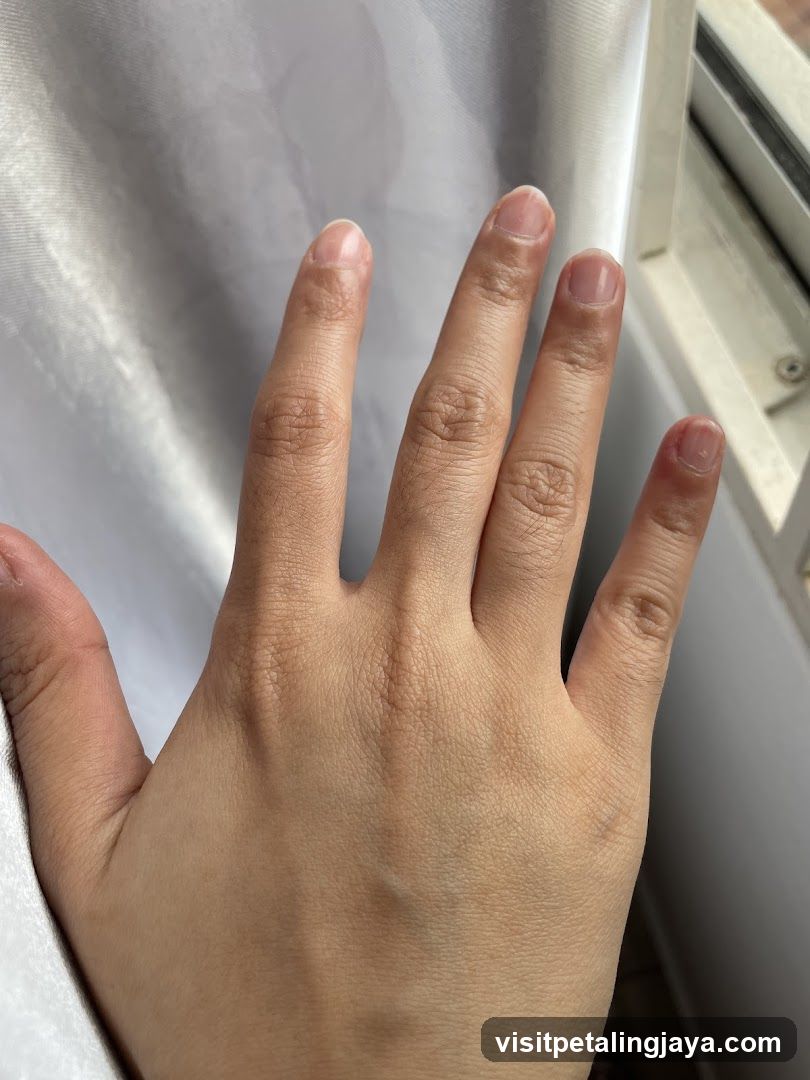 Hand near window