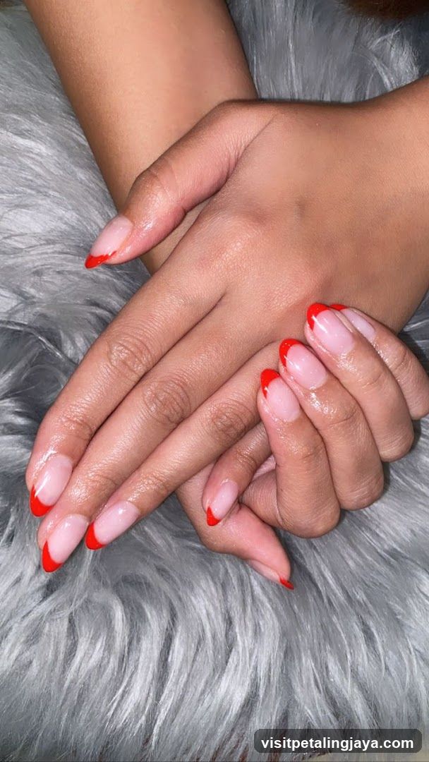 Red and Pink French Manicure on Hands