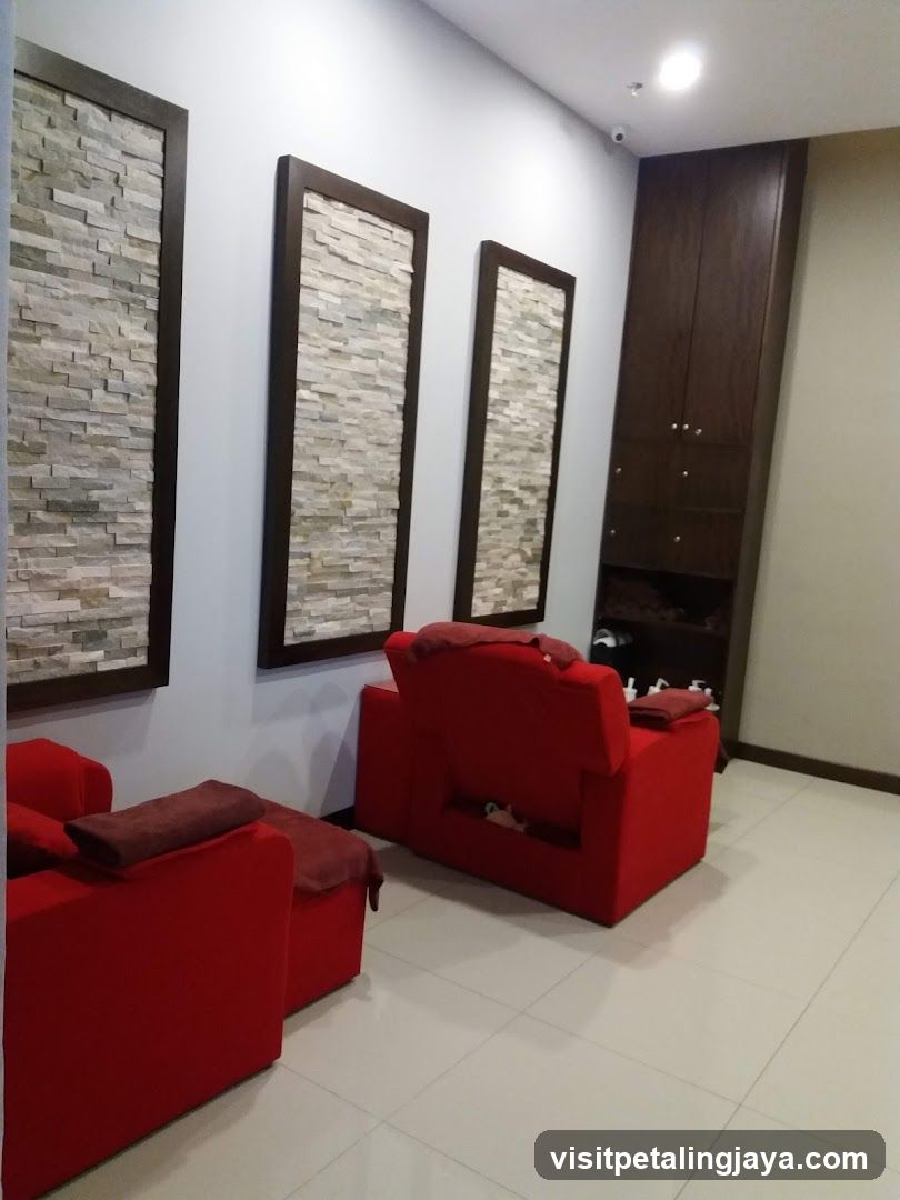 Red Lounge Area with Stone Wall Art