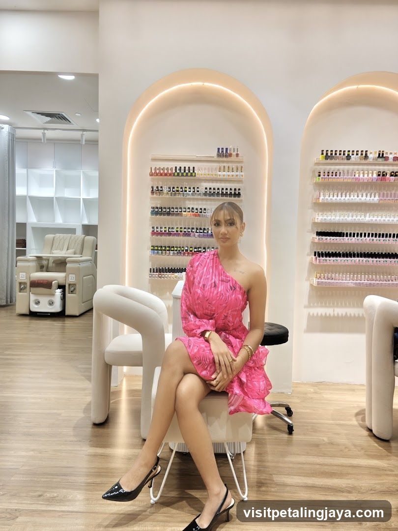 Woman in Pink Dress at Nail Salon Interior