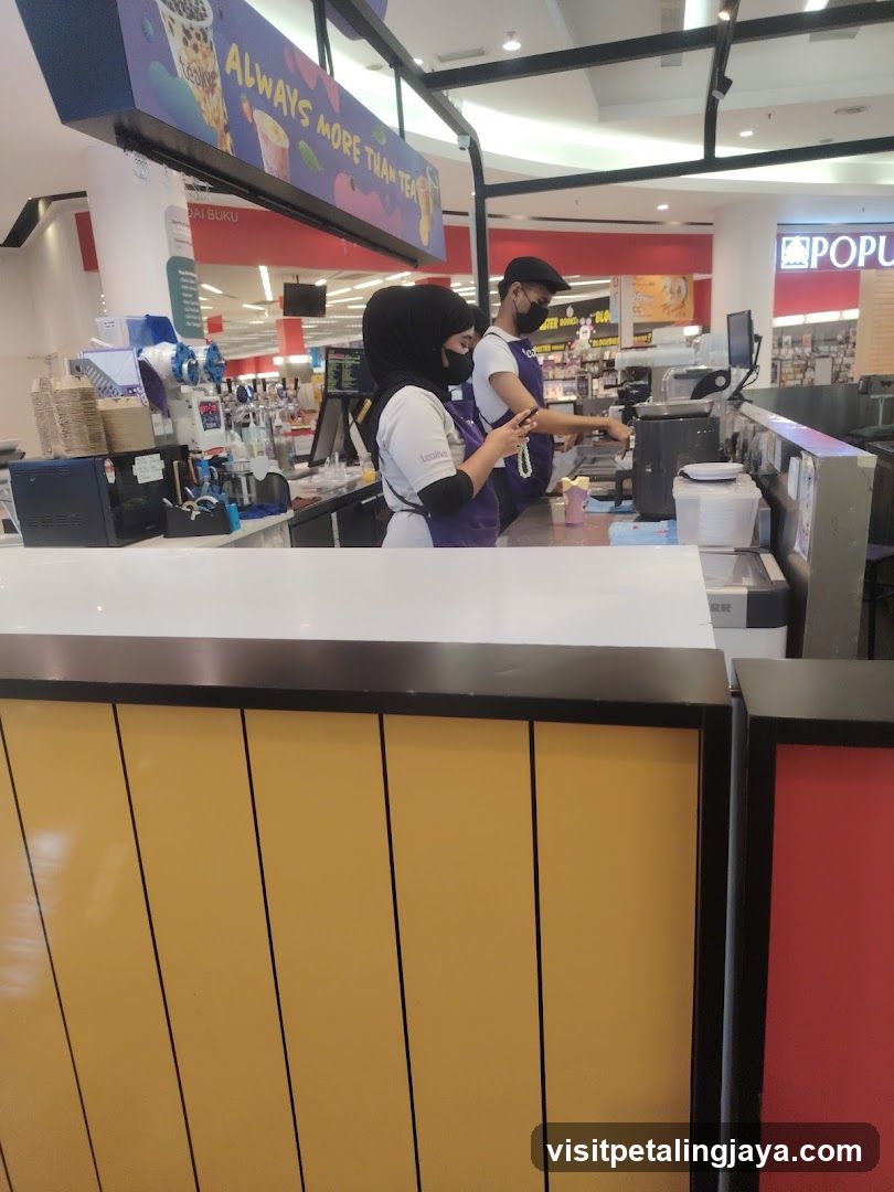 Staff at a food service counter