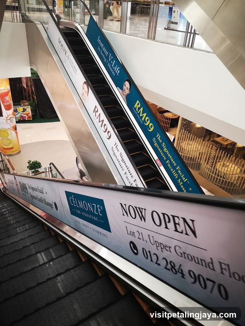 Shopping Mall Interior with Escalator Ads