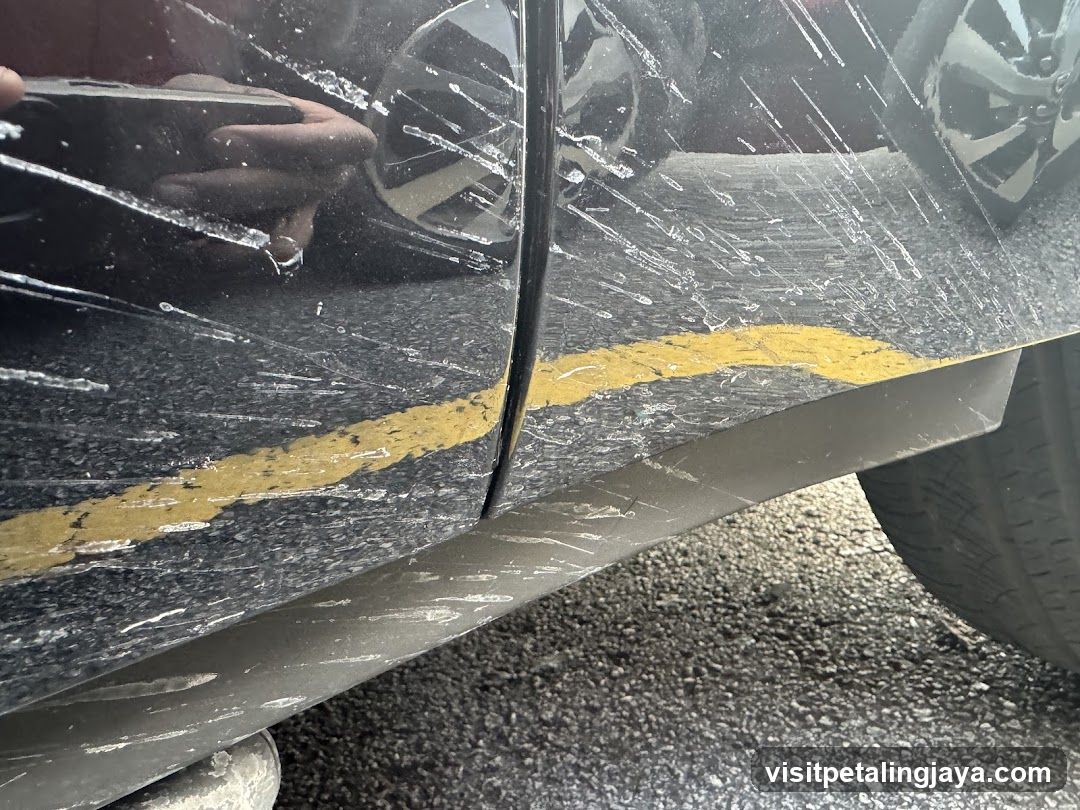 Car Door with Scratches and Reflections