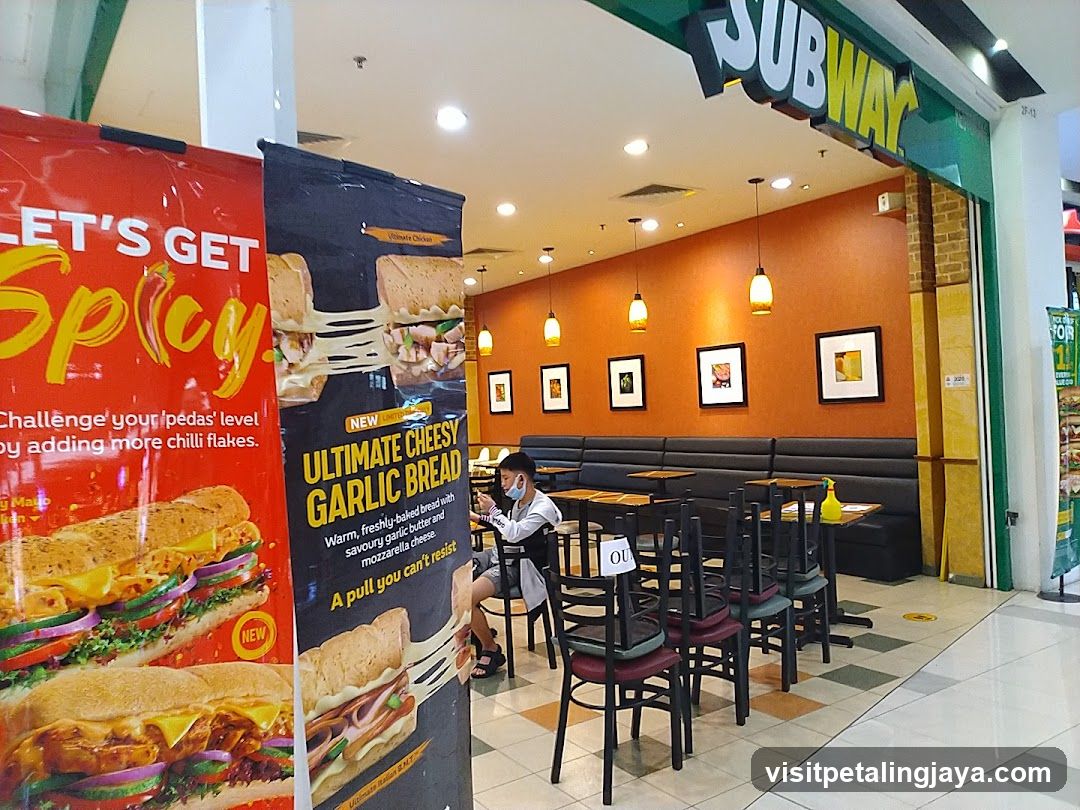 Subway Restaurant Interior with Promotional Banners