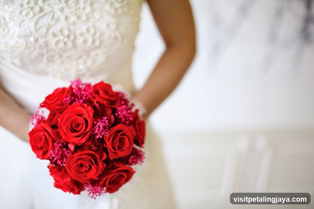 Bride Holding Red Bouquet