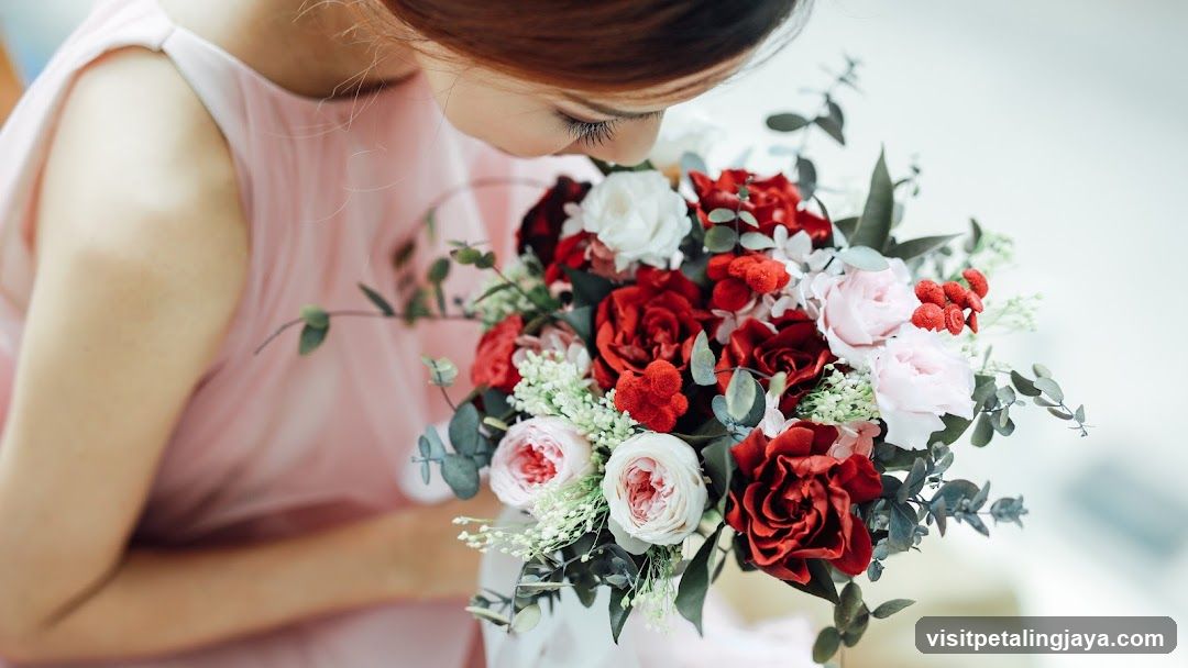 Woman Holding a Bouquet of Flowers