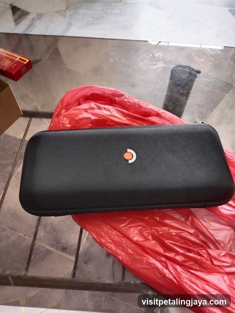 Black Case on Red Plastic Bag