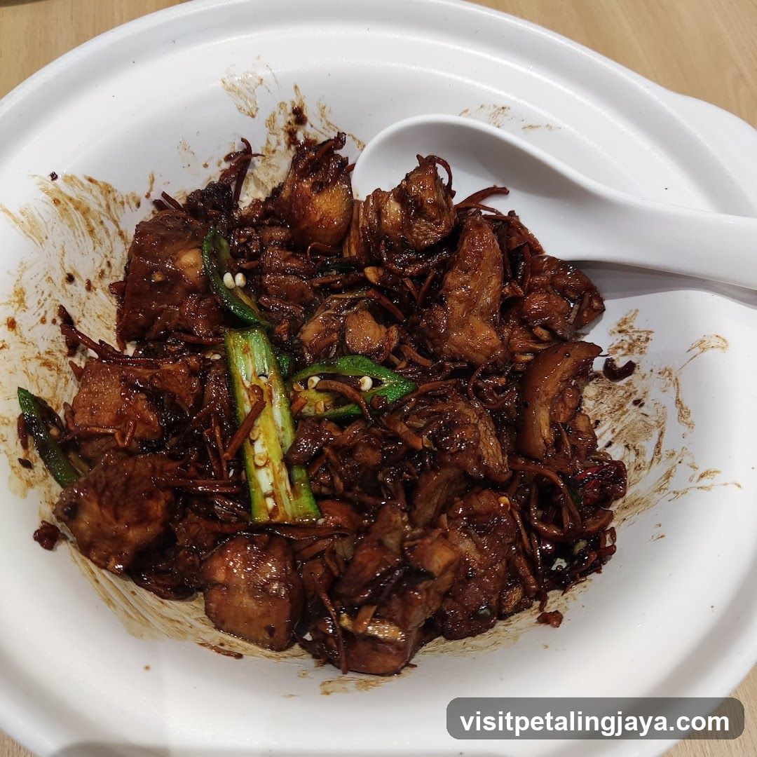 Stir-fried meat with vegetables in a bowl