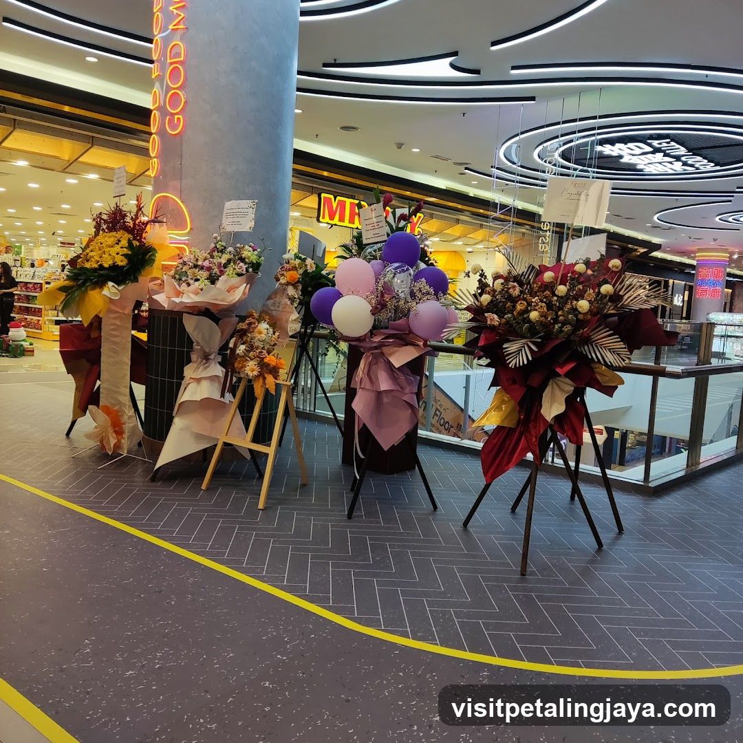 Flower tributes in mall corridor