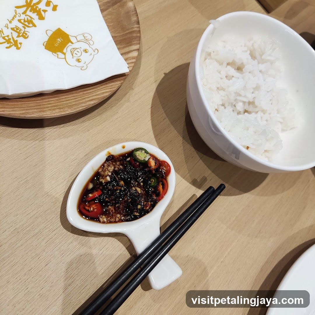 Dining Table Setting with Rice and Sauce