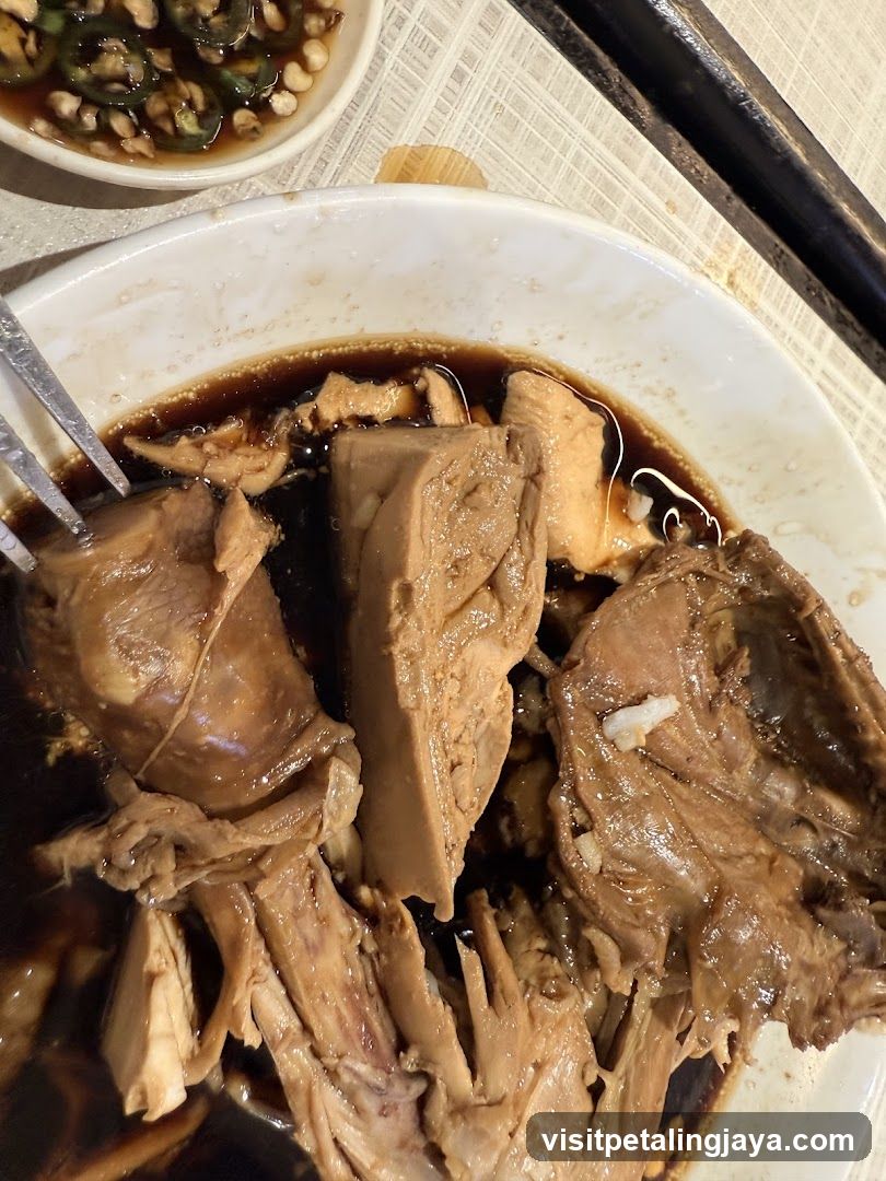 Braised Meat Dish with Sauce and Side Dipping Bowl