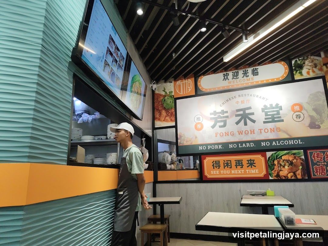 Restaurant Interior with Staff and Signage