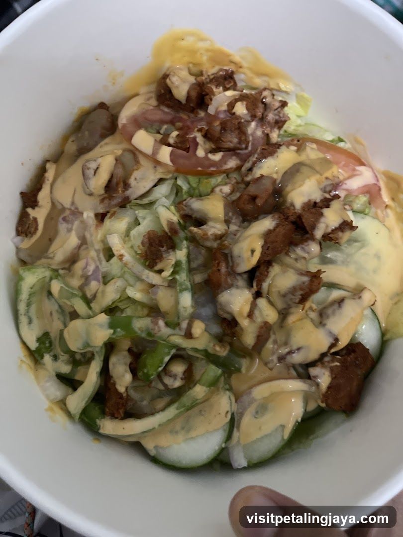 Salad Bowl with Dressing and Meat Toppings