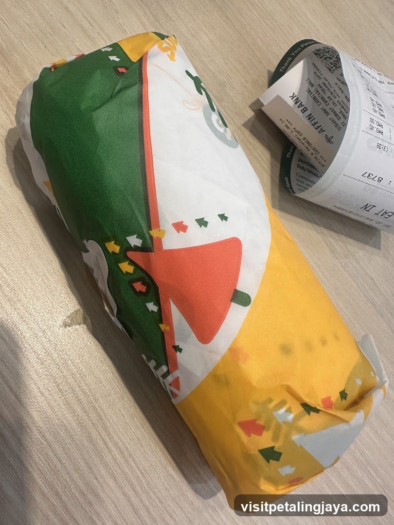 Wrapped food item with receipt