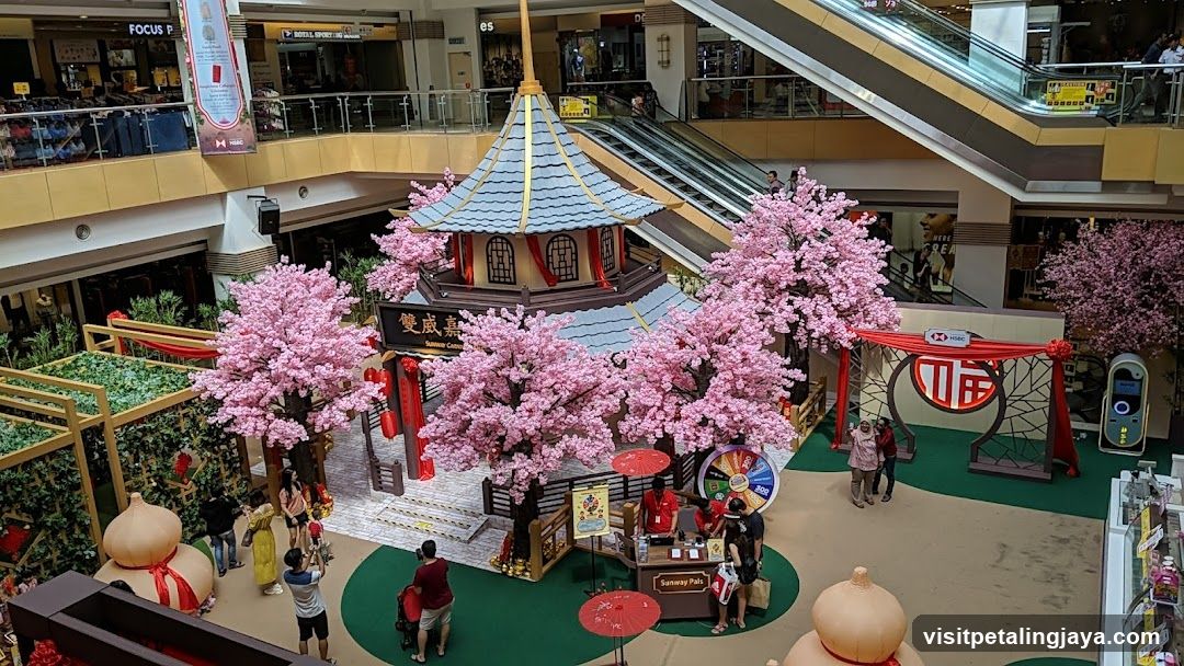 Mall Interior Decor with Cherry Blossoms and Traditional Pavilion