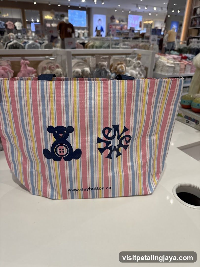 Striped tote bag with bear and logo design