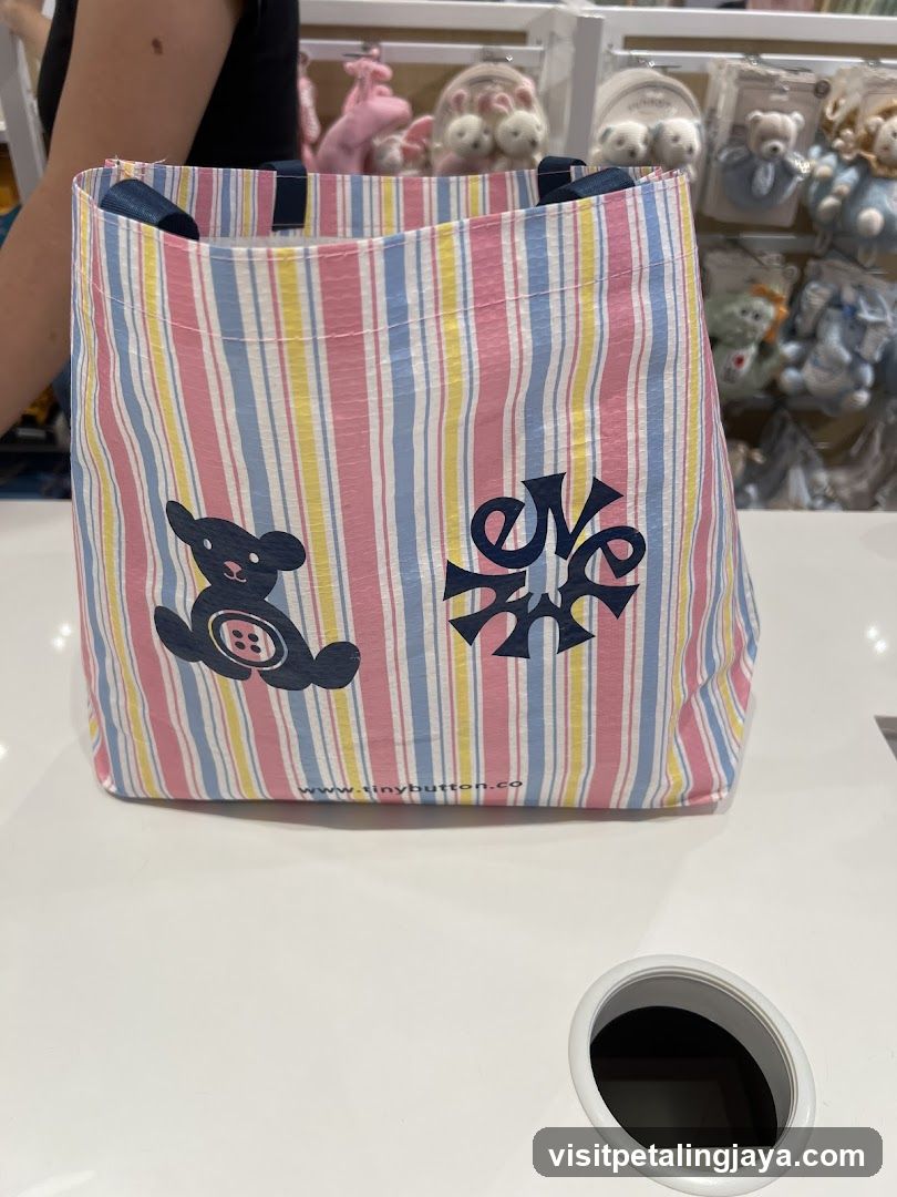 Striped tote bag with teddy bear design