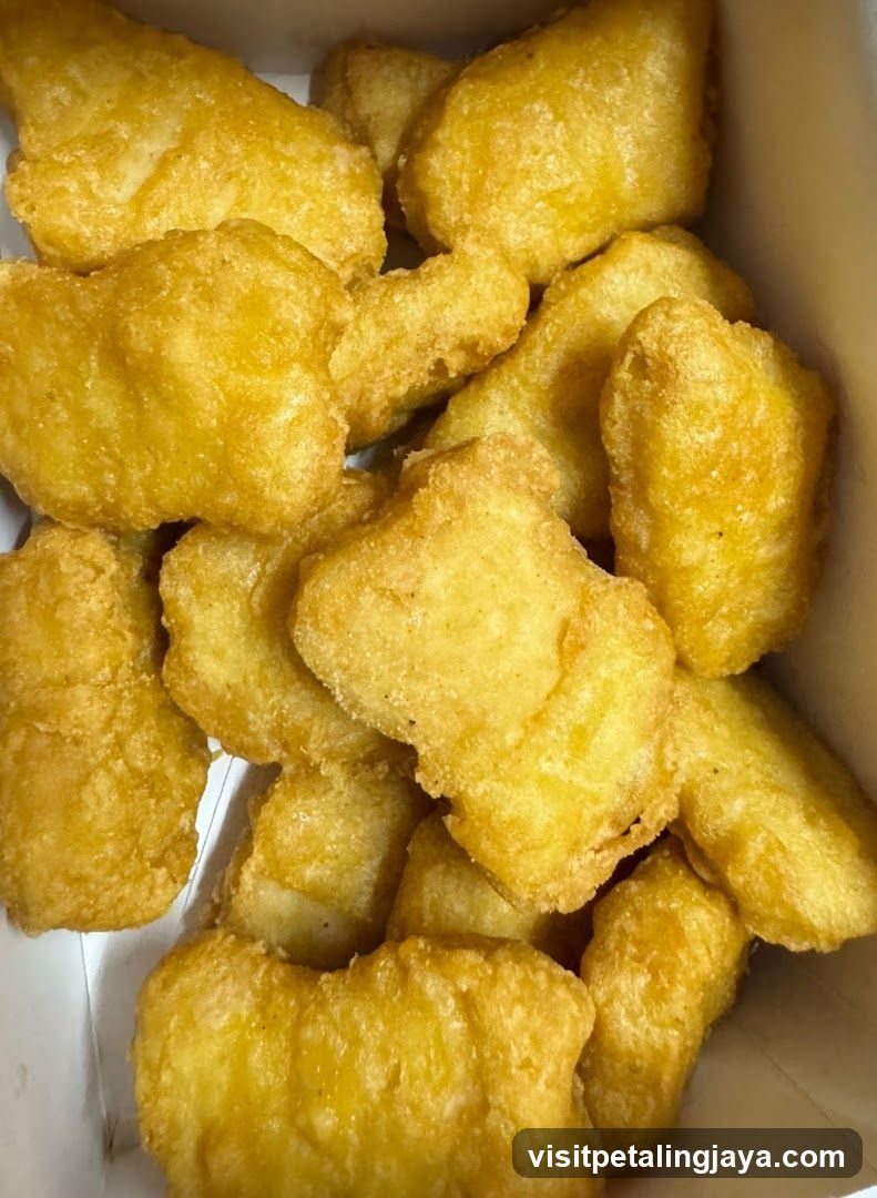 Fried Chicken Pieces in Container