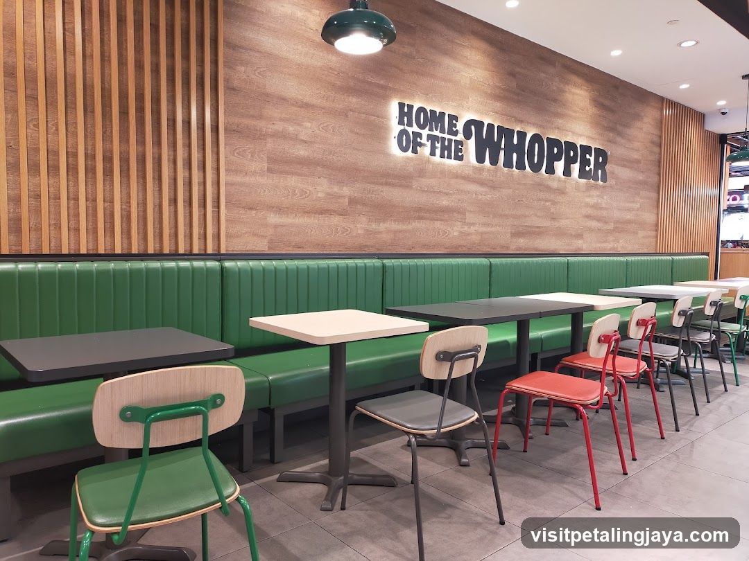 Restaurant Interior with Green Booths and Whopper Signage