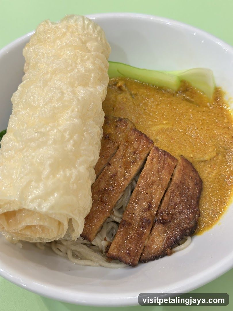 Noodle Bowl with Curry and Fried Dough