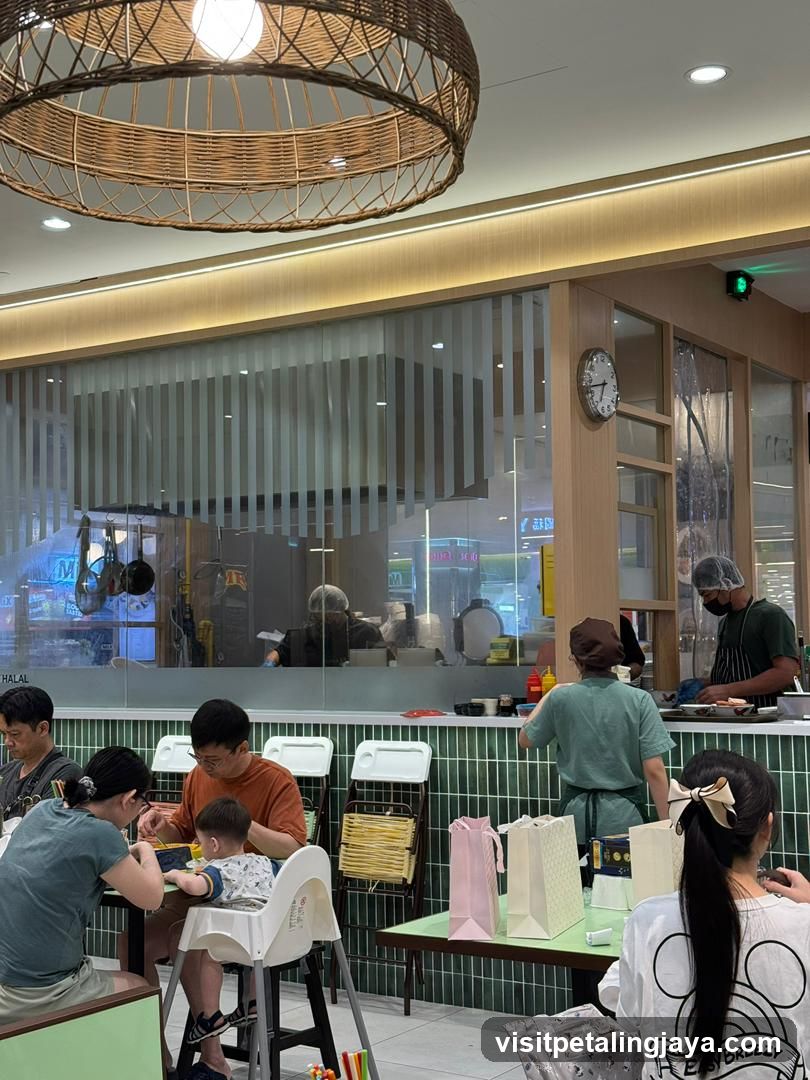 Dining Area with Staff and Customers
