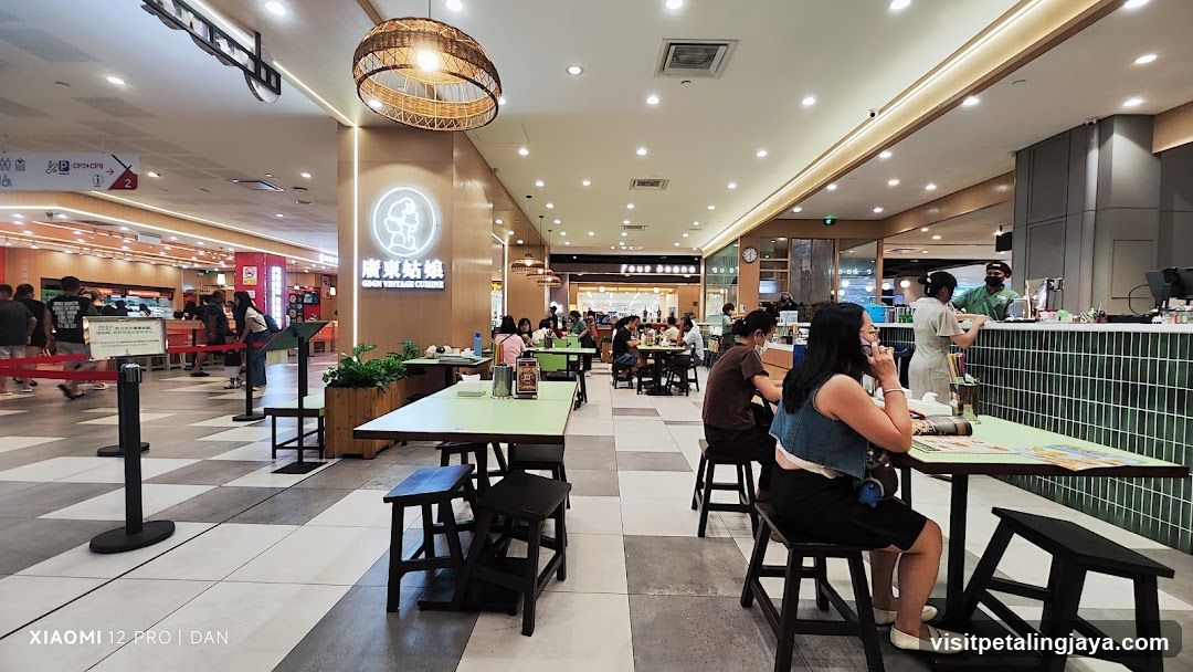 Cafe Interior with Tables and Staff