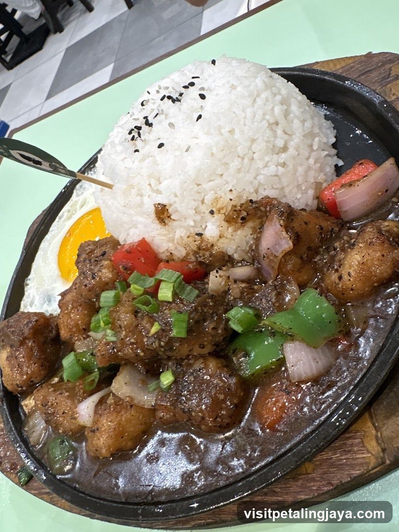 Sizzling Rice Bowl with Fried Chicken and Egg