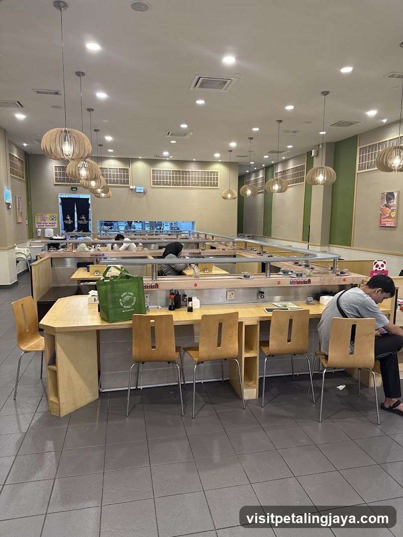 Restaurant Interior with Wooden Seating and Hanging Lamps