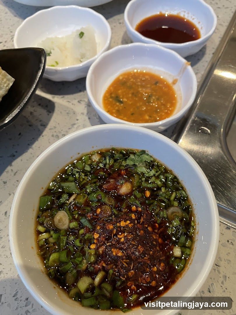 Dipping Sauces and Bowl of Soup