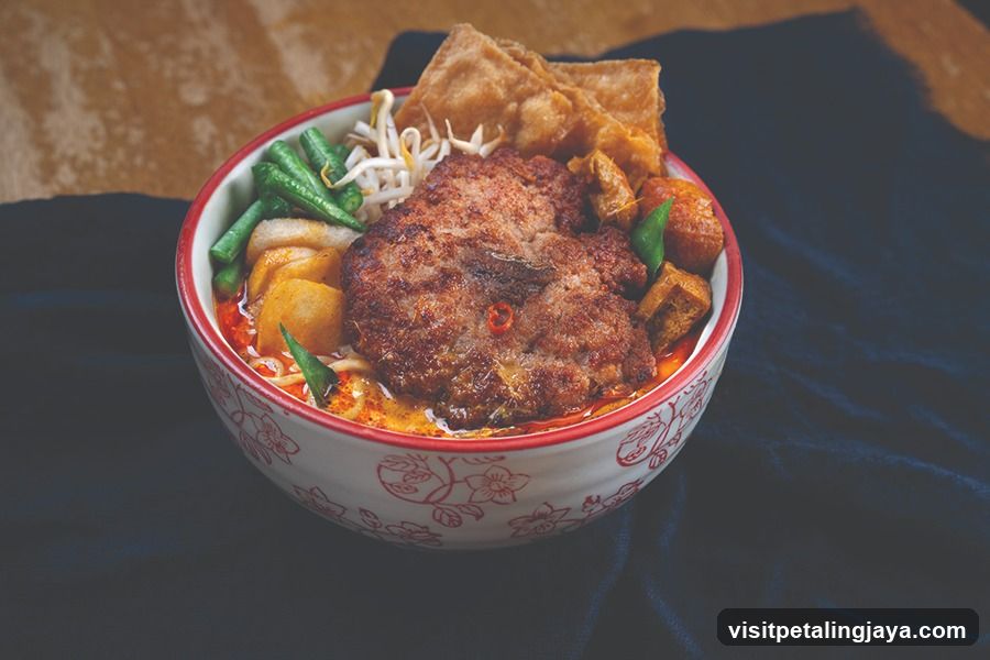 Spicy Noodle Bowl with Meatball and Vegetables